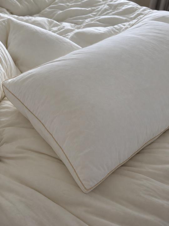 Signature Deluxe Suite Pillow photographed by Catherine R. at home